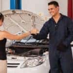 Car Owner Speaking to Technician
