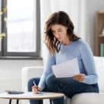 Woman examining paperwork