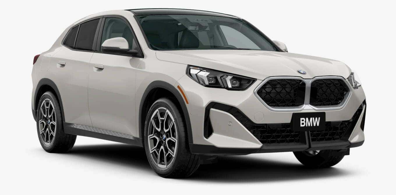 BMW X2 xDrive28i in Dune Grey Metallic shown in three-quarter angle.