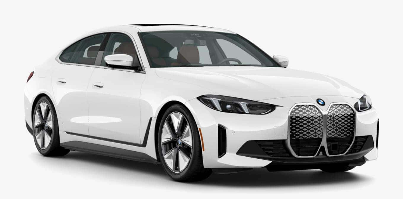BMW i4 xDrive40 in Alpine White shown in three-quarter angle.