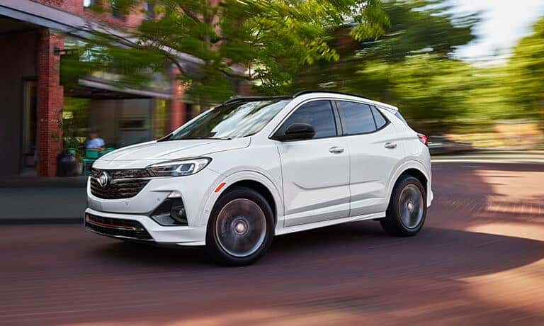 2022 Buick Encore GX exterior driving through a town