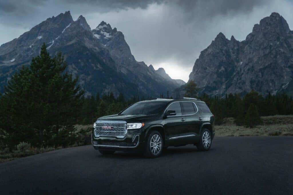 2023 GMC Acadia Denali in Front of Mountains