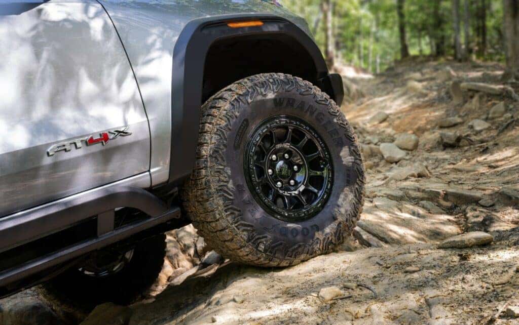 Lower shot of the 2024 GMC Canyon AT4X AEV’s Front Quarter Panel and Tire