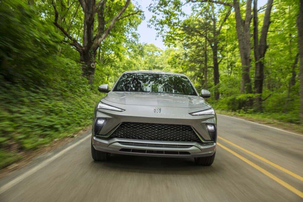 Front view of the 2024 Buick Envista Avenir in Moonstone Gray Metallic on the road. Preproduction model shown. Actual production model may vary. Arriving summer 2023.