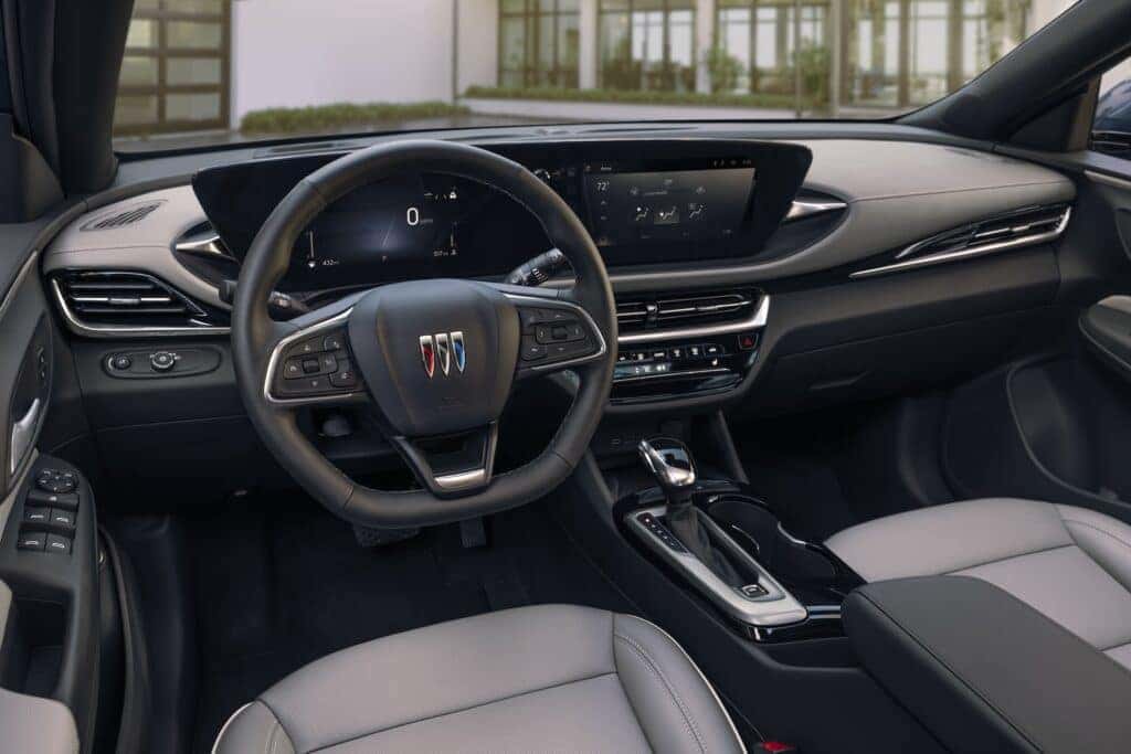 View of the driver’s seat in 2024 Buick Envista Avenir interior in Gideon with Ebony accents. Preproduction model shown. Actual production model may vary. Available in summer 2023.