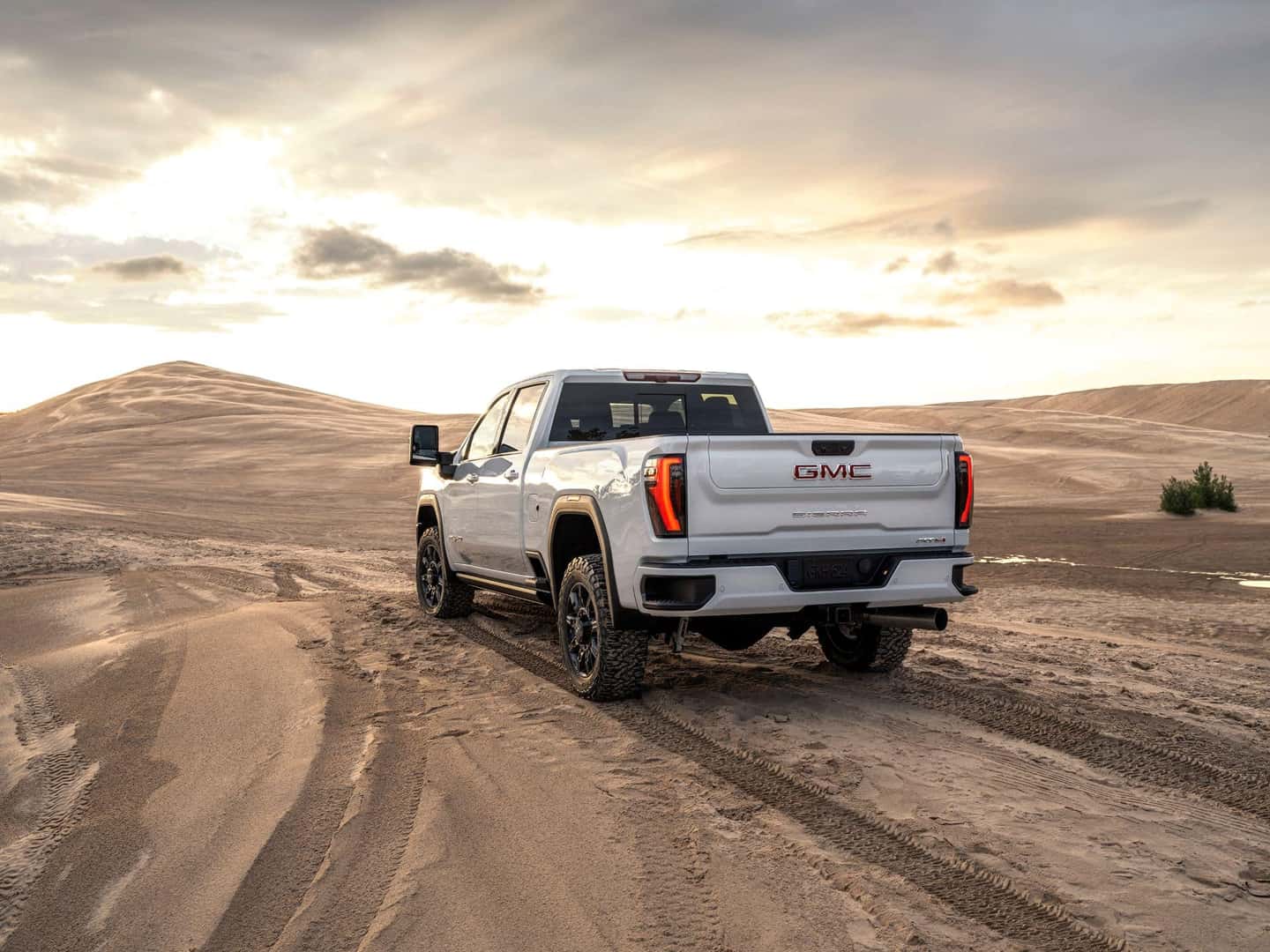 The Illustrious 2024 GMC Sierra 2500HD Racing On The Sand Dunes