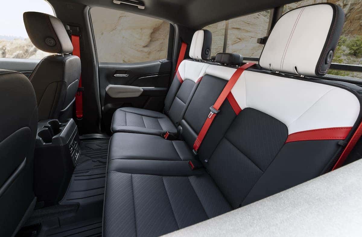 View of GMC Canyon AT4X with Edition 1 package second row interior from driver's side perspective.