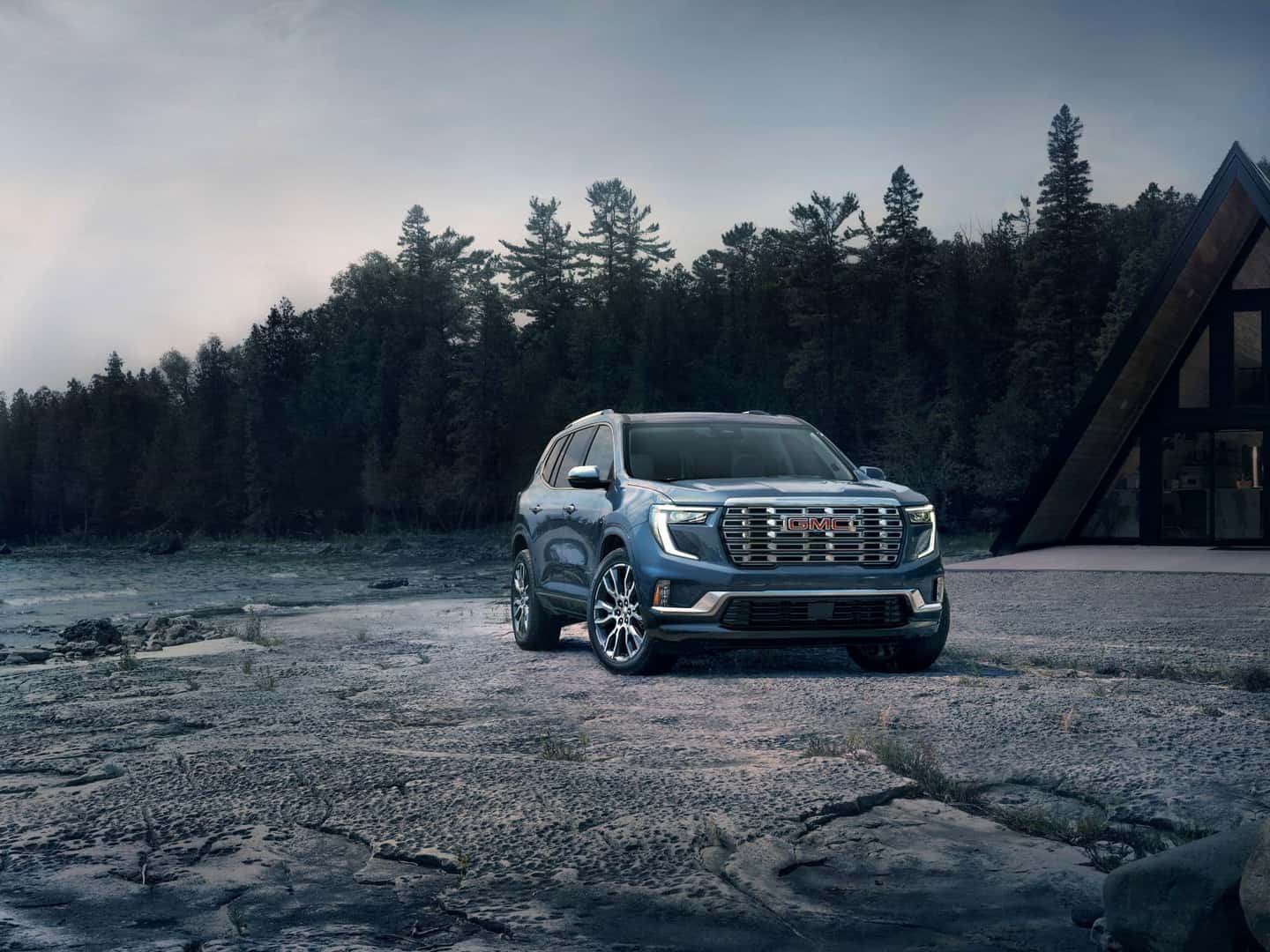 The Breathtaking 2024 GMC Acadia Denali, Parked Near A Forest