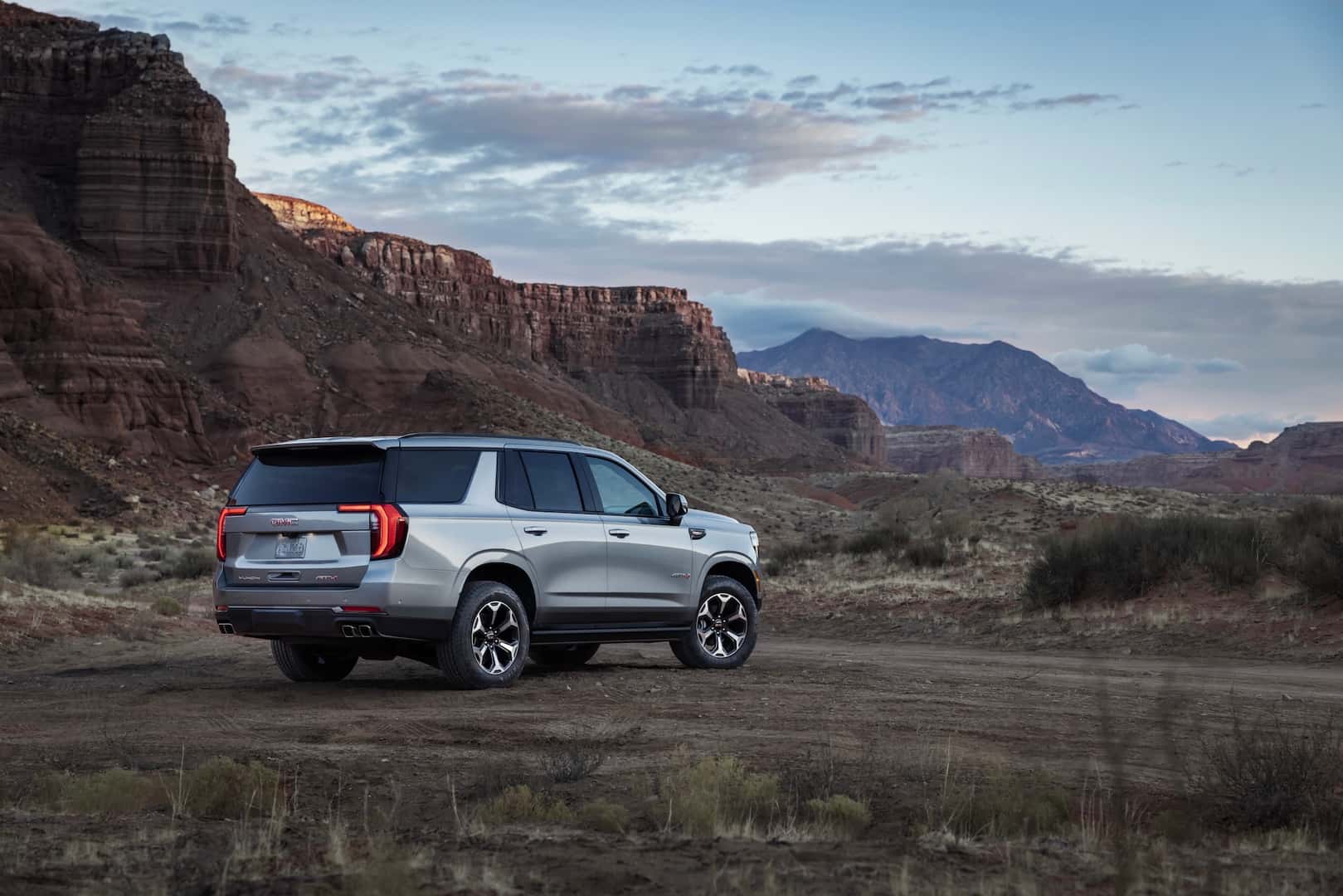 Rear 3/4 view of the 2025 GMC Yukon AT4 Ultimate.