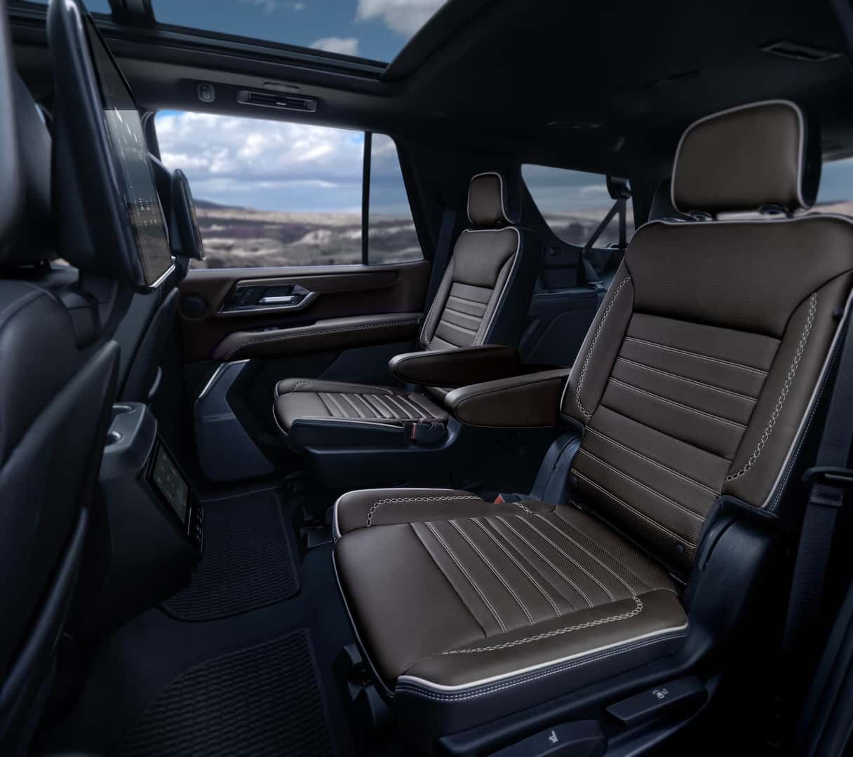 Interior view of the 2nd row seating in the 2025 GMC Yukon Denali Ultimate.