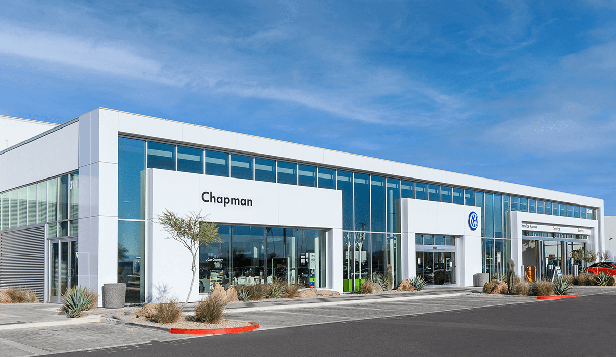 Front of Chapman Volkswagen Scottsdale building on a sunny day.
