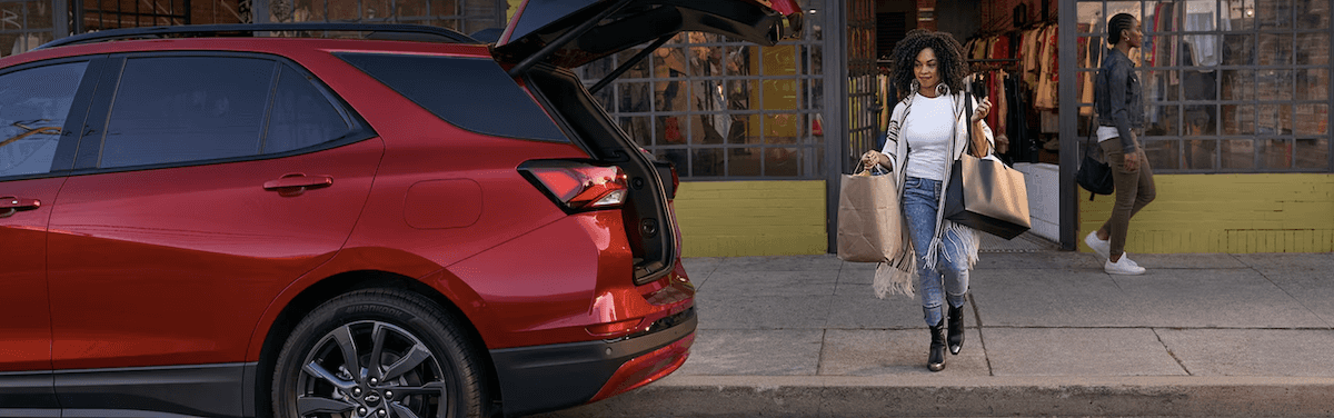 Red 2024 Chevy Equinox with tailgate open