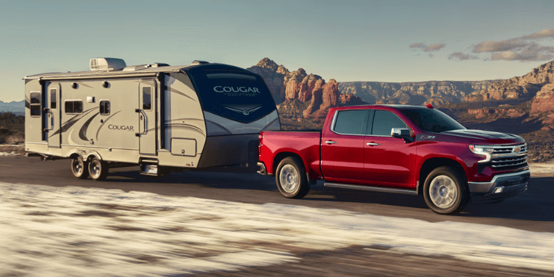 Chevrolet truck towing a camper