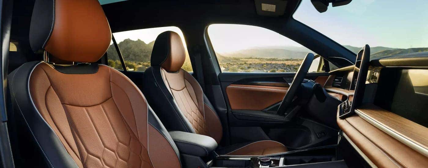 Black and tan leather interior in a 2025 Volkswagen Tiguan at a dealer
