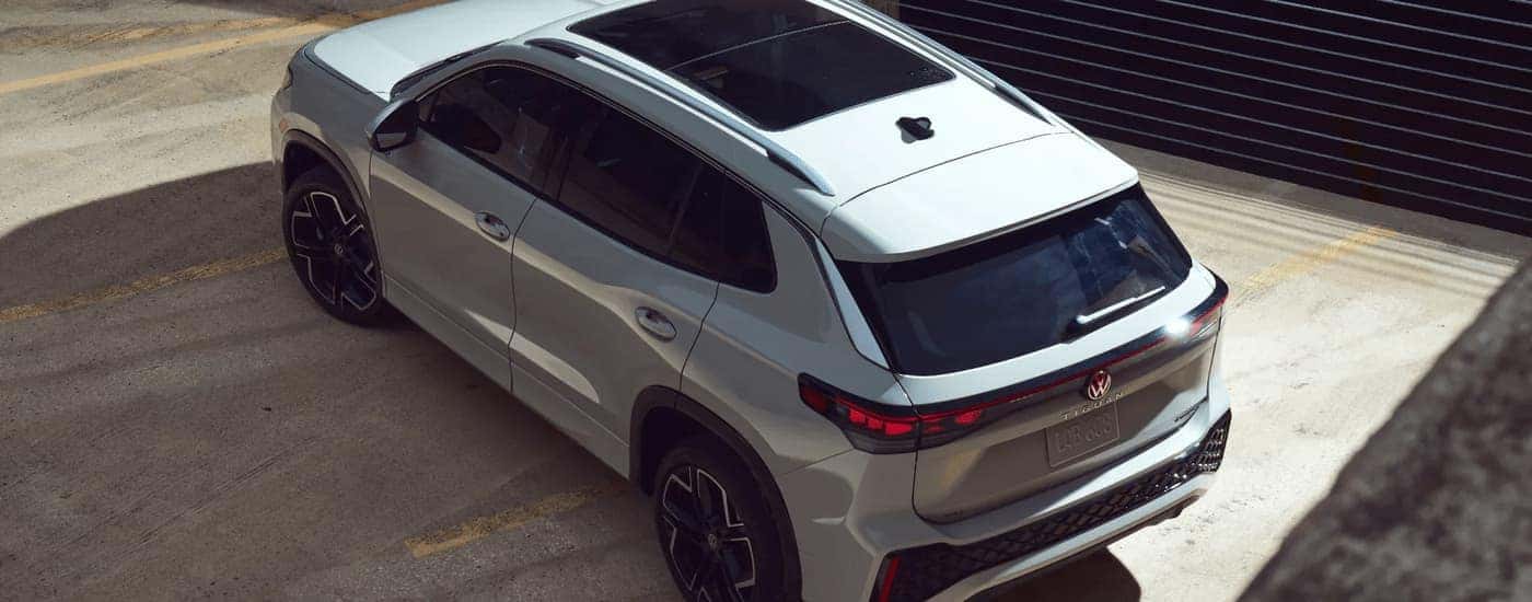 White 2025 Volkswagen Tiguan parked in a garage