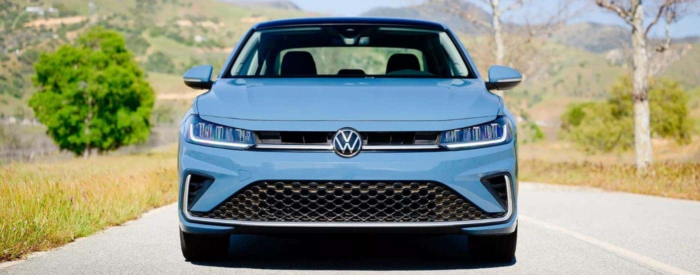 A blue 2026 Volkswagen Jetta from the front.