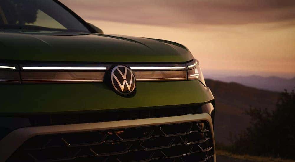 Front grille on a green 2026 Volkswagen Taos for sale near Elgin