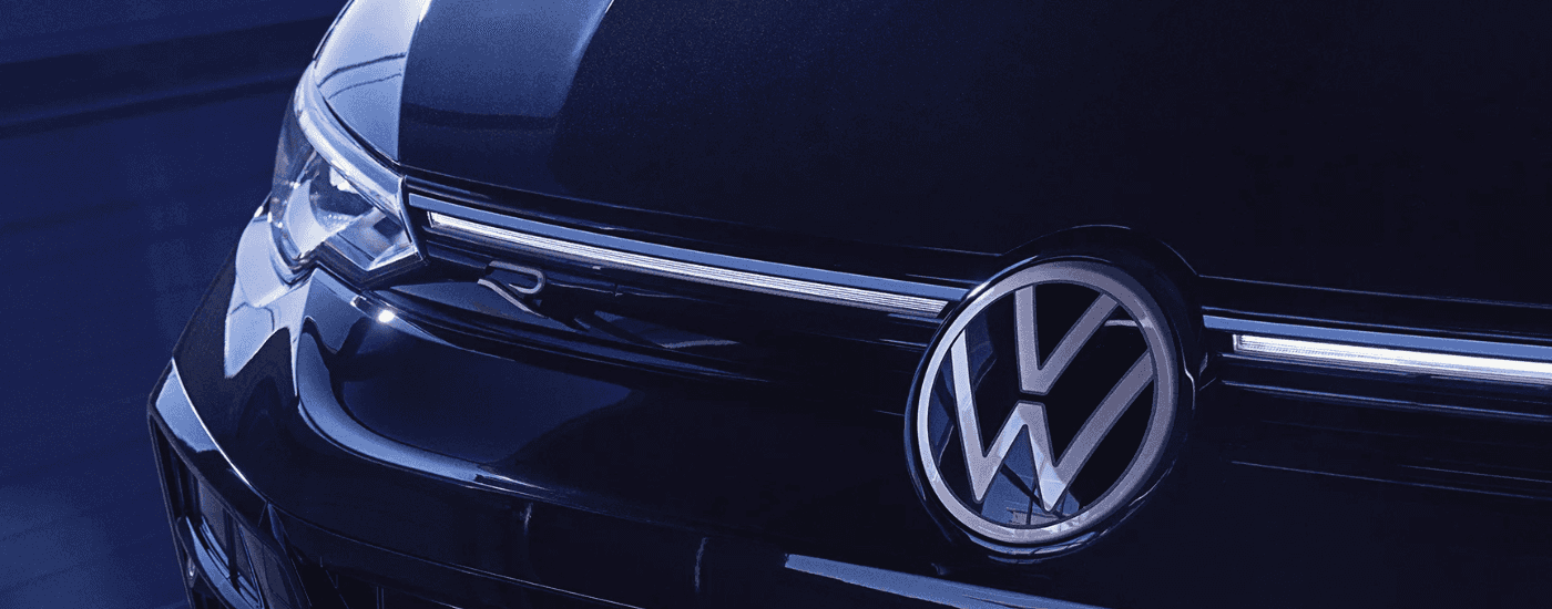 Front badge on a black 2026 Volkswagen Golf R