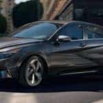 2021 Hyundai Elantra turning a corner on in the city
