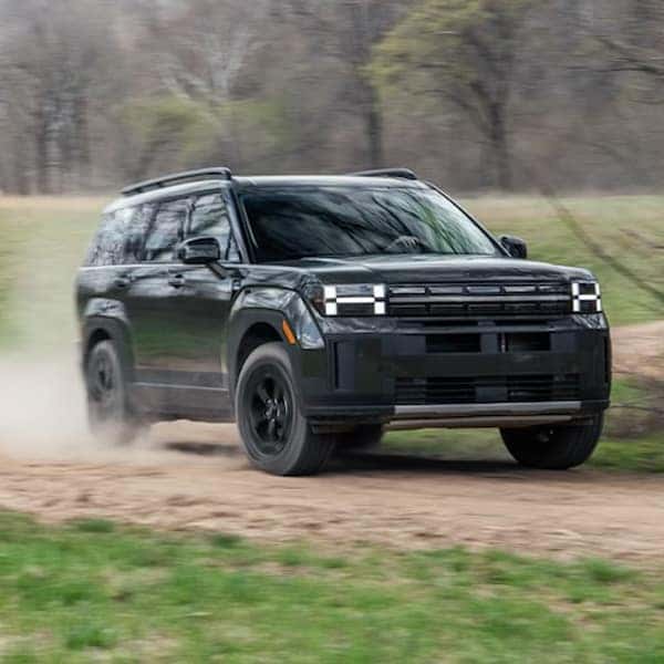2024 Hyundai Santa Fe Hybrid taking it offroad down the dirt path
