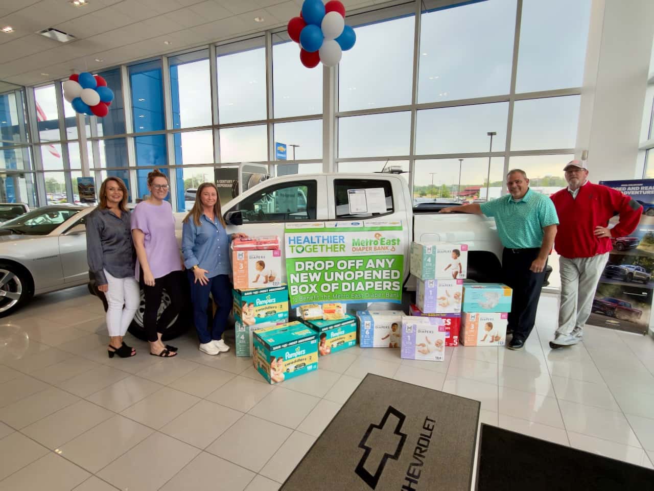 Jack Schmitt Chevrolet of Wood River diaper drive donation for Metro East Diaper Bank