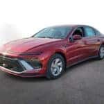2026 Hyundai Sonata in red, front three-quarter view, at Joseph Airport Hyundai in Dayton, Ohio