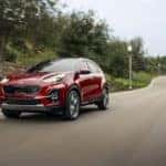 2022 Kia Sportage red highway