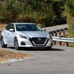 2021 Nissan Altima Sedan Driving Down Street