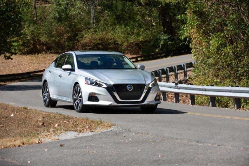 2021 Nissan Altima Sedan Driving Down Street