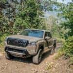 2022 Nissan Frontier Driving Down Dirt Road