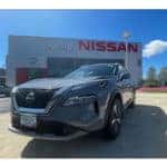 2023 Nissan Rogue SUV parked in front of Kelly Nissan of Woburn