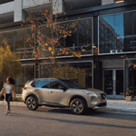 Nissan Rogue parked on city street
