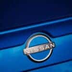 Blue Nissan Model with Nissan Logo on back