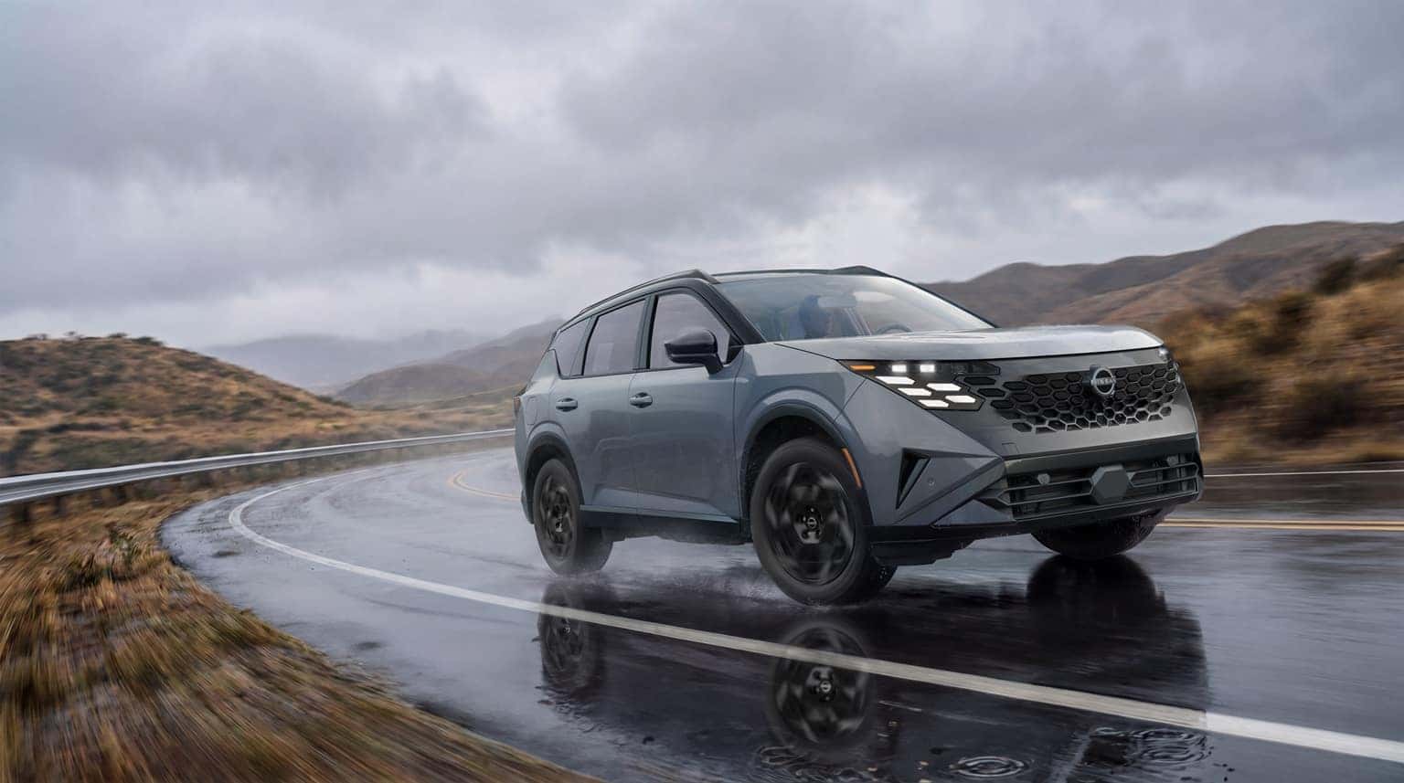 2027 Nissan Rogue Hybrid on an open road