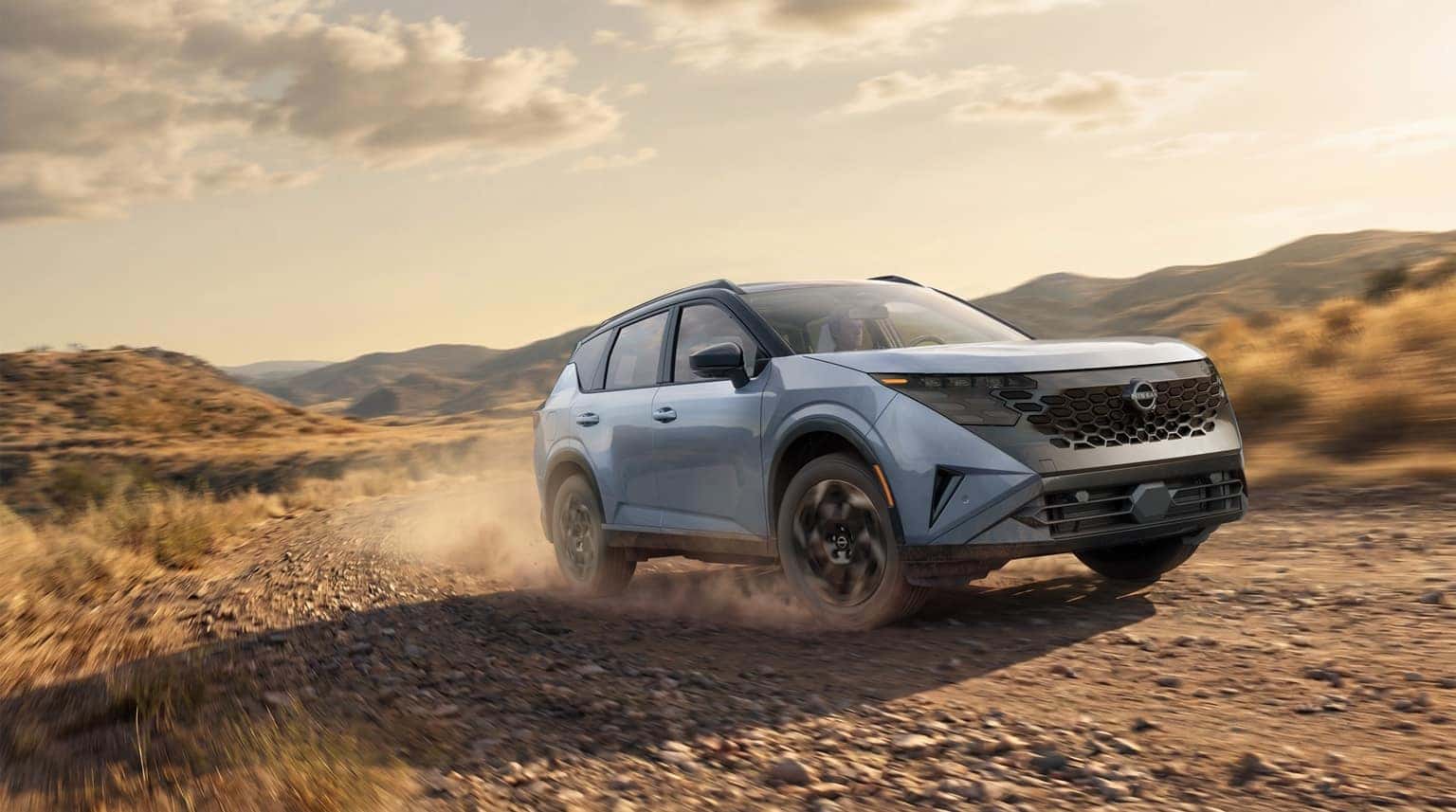 2027 Nissan Rogue Hybrid in rainy driving conditions