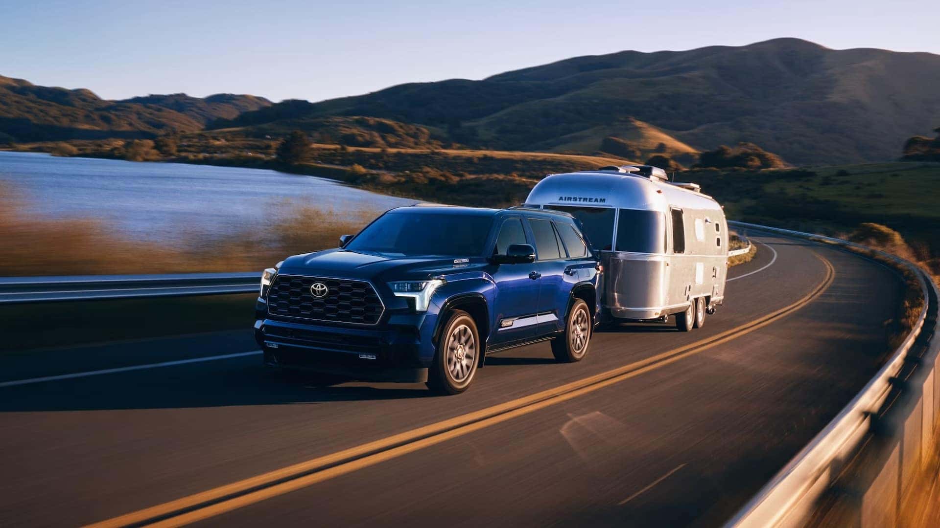 Blue 2025 Toyota Sequoia Towing Airstream Camper Near Hammond, LA