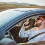 Man singing while he is driving